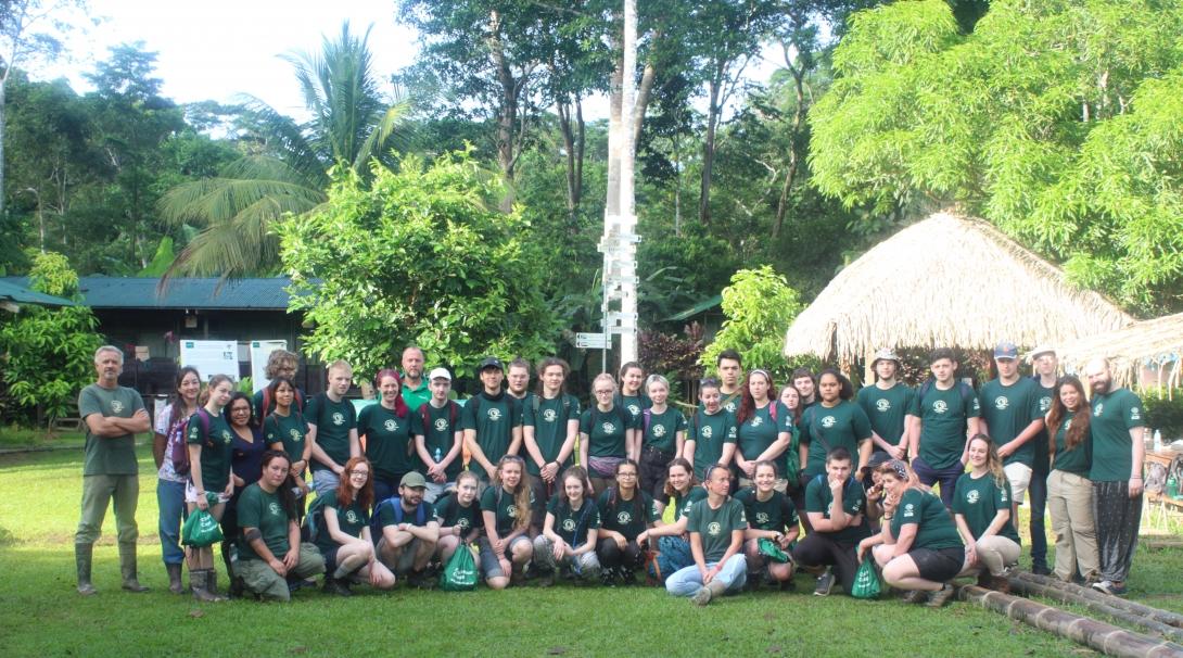 The conservation team take a photo with a group of volunteers in Peru on a volunteer program in South America A group of volunteers take a break during their volunteer trip to South America